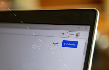 t. Log in message on a digital device screen, closeup view.