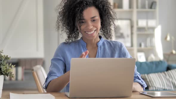 Online Video Chat on Laptop By African Woman