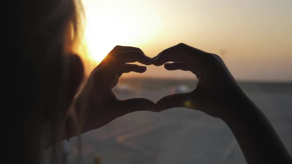 Girl Doing Heart Hands Child Hands Forming a Heart Shape with Sunset Silhouette Love Dream Travel