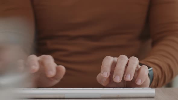 Hands of Unrecognizable Man Typing 