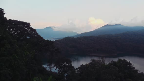 Flight Overlooking the Sacred Lakes of Tamblingan and Beratan Located High in the Mountains in the