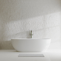 Modern contemporary bathroom design with bathtub and decorative concrete wall with sunlight - PhotoDune Item for Sale