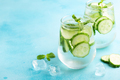 Fresh infused cucumber water on a light blue background - PhotoDune Item for Sale