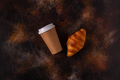 Coffee to go in a paper cup with croissants. - PhotoDune Item for Sale