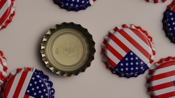 Rotating shot of bottle caps with the American flag printed on them