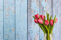 tulips and old wooden wall background - PhotoDune Item for Sale