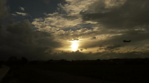 Airplane Flying in Cloudy Sky