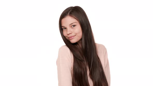 Close Up Portrait of Charming Lady with Beautiful Hair Posing on Camera Smiling Happily Being Flirty