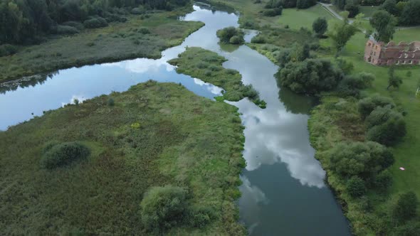 Park area. A winding river with water lilies. Swampy area. Aerial photography.