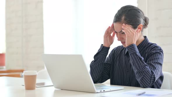 Stressed Young Indian Woman Having Headache 