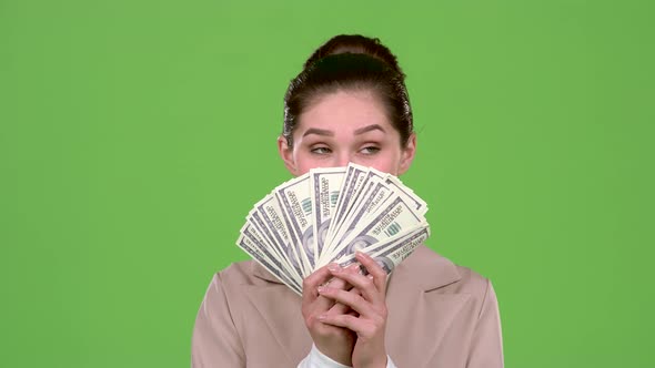 Woman Received Paper Money for a Major Deal. Green Screen. Slow Motion