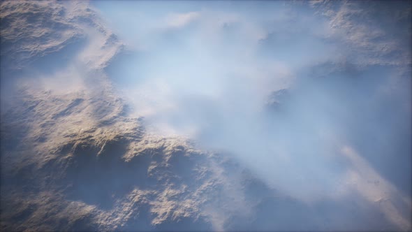 Distant Mountain Range and Thin Layer of Fog on the Valleys