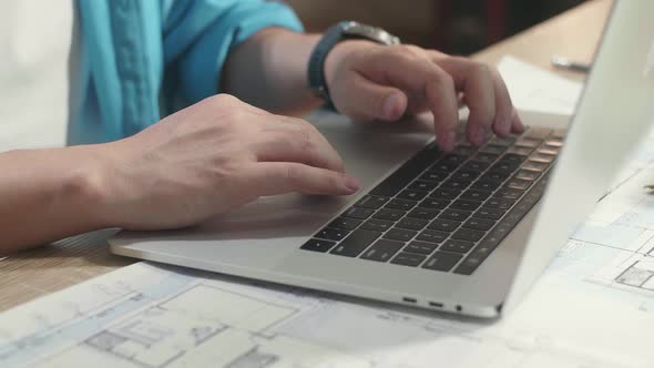 Close Up Of Hand's Man Engineer Typing On A Laptop At The Office