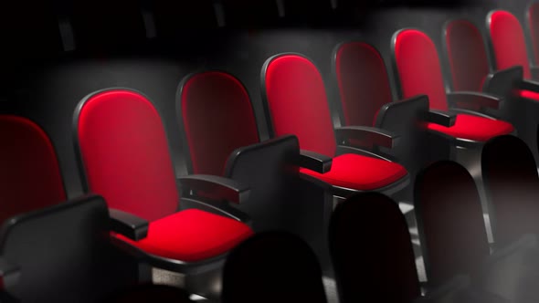 Rows of chairs in a cinema hall. Social distance. Movie theatre during COVID-19