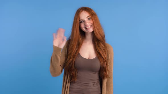 Redhead Girl in Brown Tshirt and Cardigan