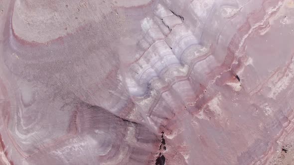 Aerial view looking down at the texture of the colorful desert