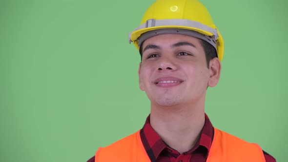 Face of Happy Young Multi Ethnic Man Construction Worker Thinking