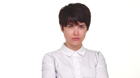 Offended Disappointed Woman with Serious Look Expressing Rejection Saying No Isolated Over White