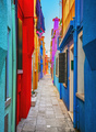 Burano island narrow street, colorful houses in the venetian lagoon. Italy - PhotoDune Item for Sale