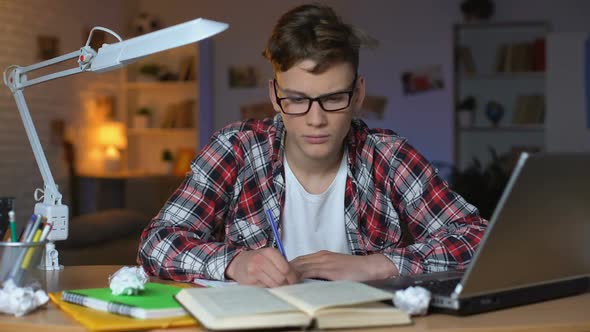 Anxious Teenager Student Trying to Solve Difficult Math Assignment Tearing Paper