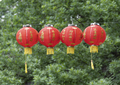 Red Lantern Chinese Festival Against The Background Of Green Trees And Sky. - PhotoDune Item for Sale