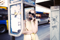 Woman chatting on a public telephone - PhotoDune Item for Sale