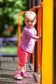 Small infant standing in playground - PhotoDune Item for Sale