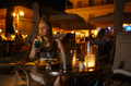 Woman enjoying a drink in a pub or restaurant - PhotoDune Item for Sale