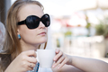 Young woman drinking coffee - PhotoDune Item for Sale