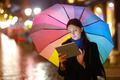 Woman with Tablet PC in the Rain - PhotoDune Item for Sale
