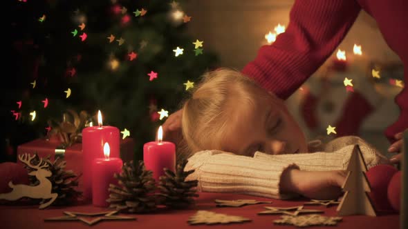 Mother Stroking Nice Girl Fallen Asleep Near Beautifully X-Mas Decorations, Home