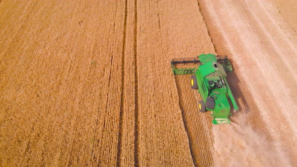  Impressive Flight Over a Working Combine Harvesting Tons of Ripe Barley