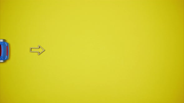 The Toy Car Driving From the Right to the Left From the Top Down and  Vice Versa. Stop Motion