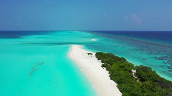 Aerial above panorama of luxury shore beach adventure by blue lagoon with bright sand background of 