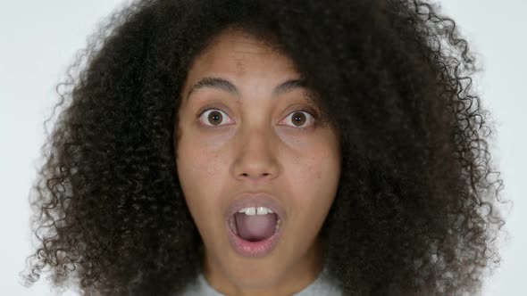 Close Up of Shocked African Woman White Background