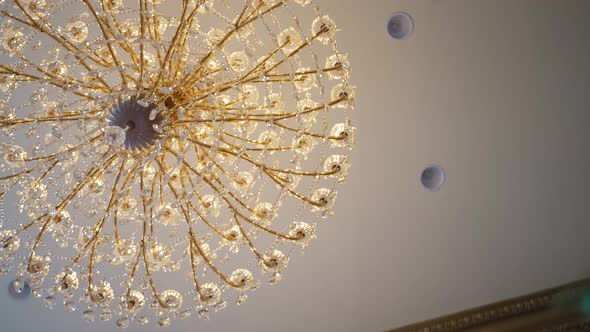 Looking straight up at chandelier