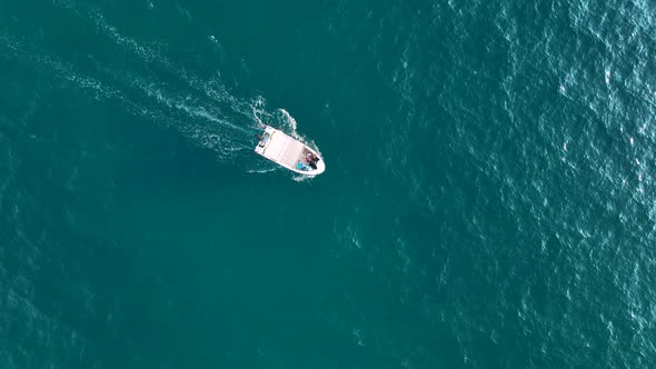 Luxury yacht sails to the port aerial view 4 K Turkey Alanya