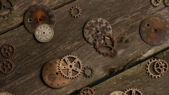 Rotating stock footage shot of antique and weathered watch faces 