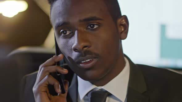 African Office Worker Making Phone Call