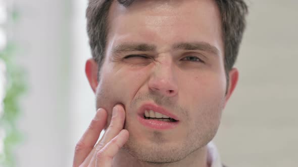 Close Up of Man Having Cavity Toothache