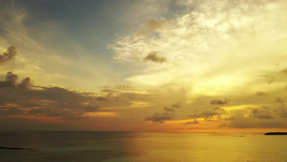 Daytime flying abstract view of a sunshine white sandy paradise beach and blue water background in h