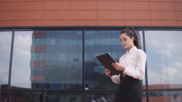 Businessman Shaking Hands with Business Girl