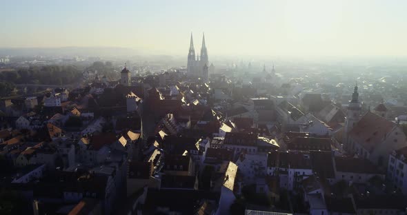 Drone shot of Regensburg and the old town in golden October