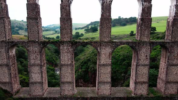 Crossing an acient aqueduct in mexico