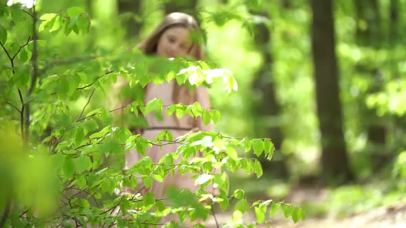 Girl Walks in the Woods