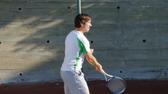 Active man playing tennis