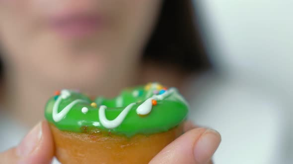 A Woman is Holding an Air Donut in Her Hand