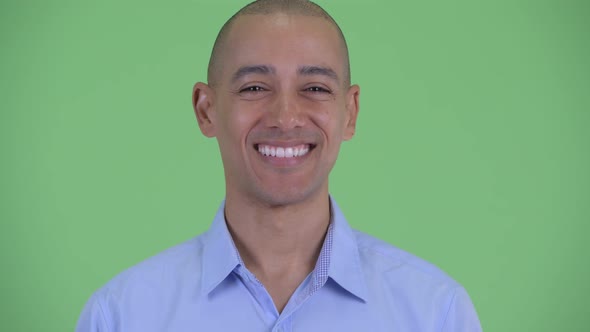 Face of Happy Bald Multi Ethnic Businessman Smiling