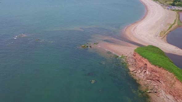 4K Aerial, flying along the Jurassic Coast in Budleigh Salterton, Devon