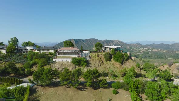 Aerial Luxury Real Estate, Drone Shot of Hollywood Hills Homes on Beautiful Sunny California Day